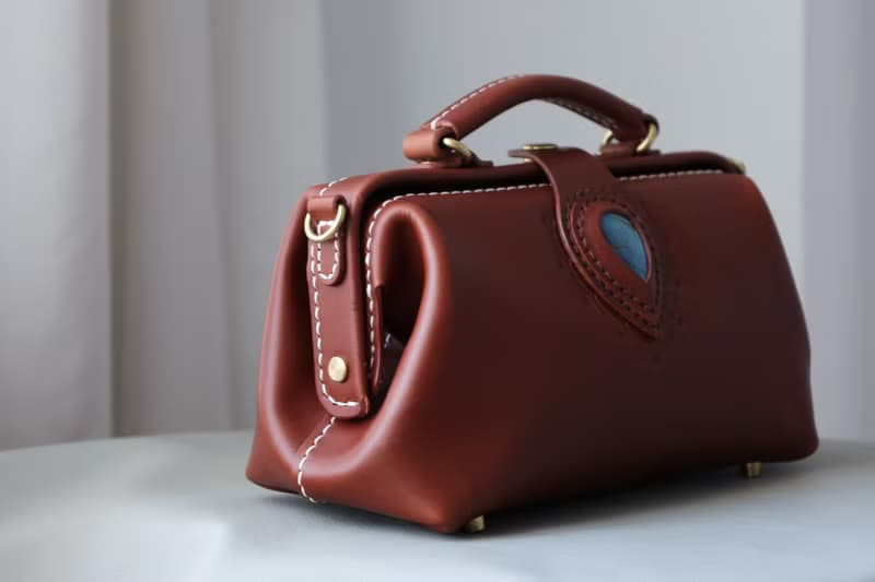 天使之眼 复古横版医生包斜挎包 手提口金包 巧克力色