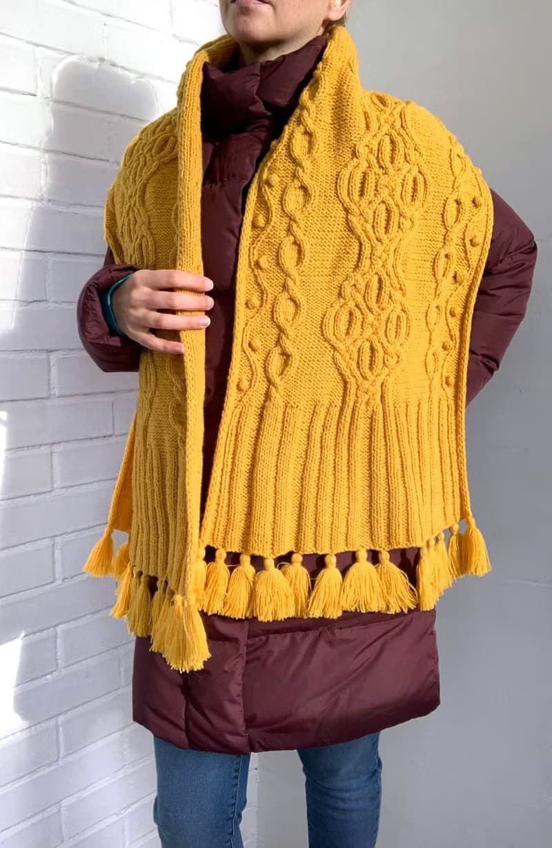 Handmade mustard scarf with beautiful pattern and tassels knitted from merino