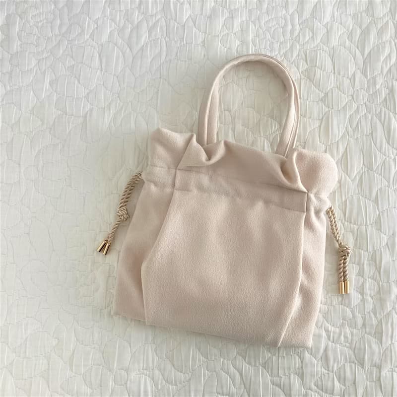 クレープアムンゼン タック巾着ミニバッグ ミルクベージュ