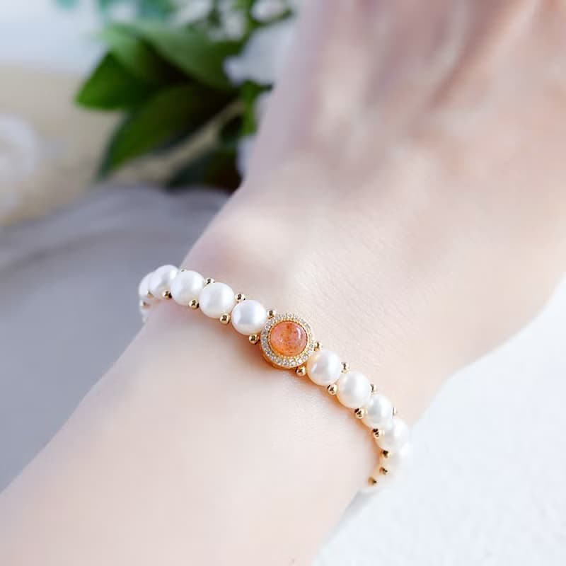 成功へと導いてくれる　キスミー　サンストーンとバロックパールの手編みブレスレット 5月/6月誕生石