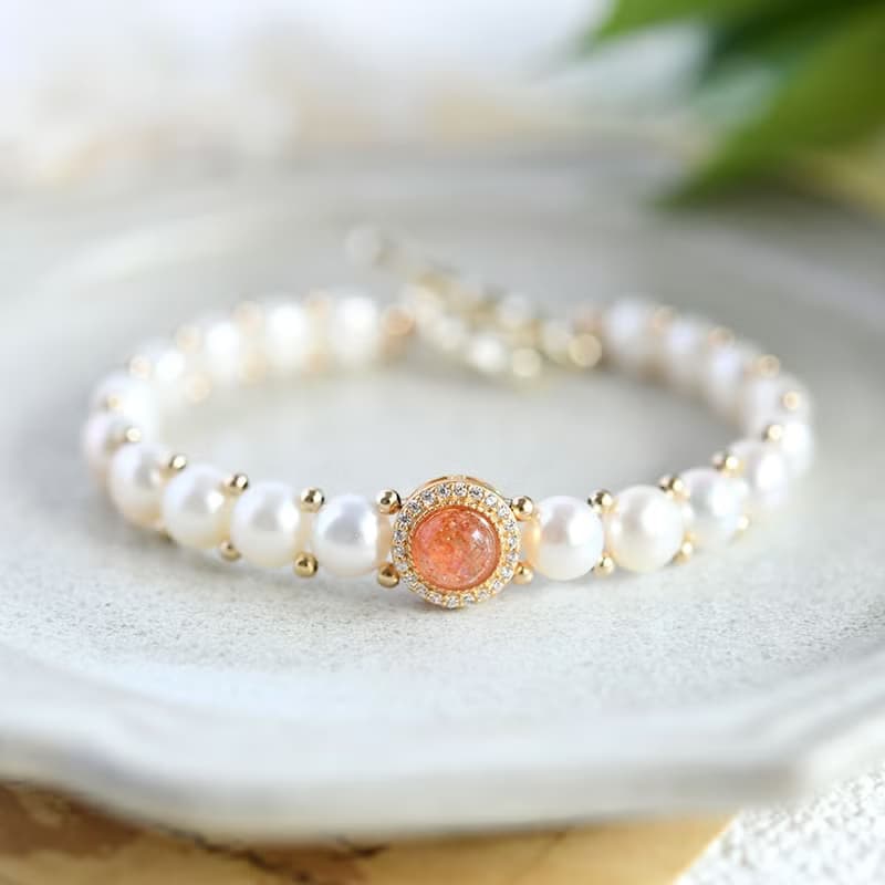 成功へと導いてくれる　キスミー　サンストーンとバロックパールの手編みブレスレット 5月/6月誕生石