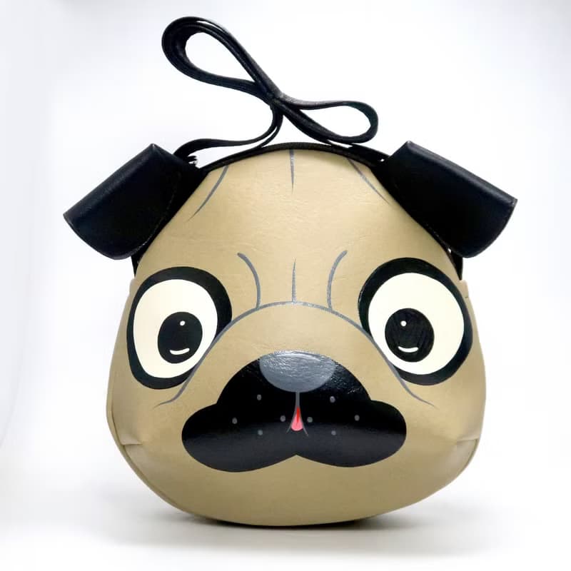 Pug crossbody bag is compact fro carrying mobile phones and other essentials.