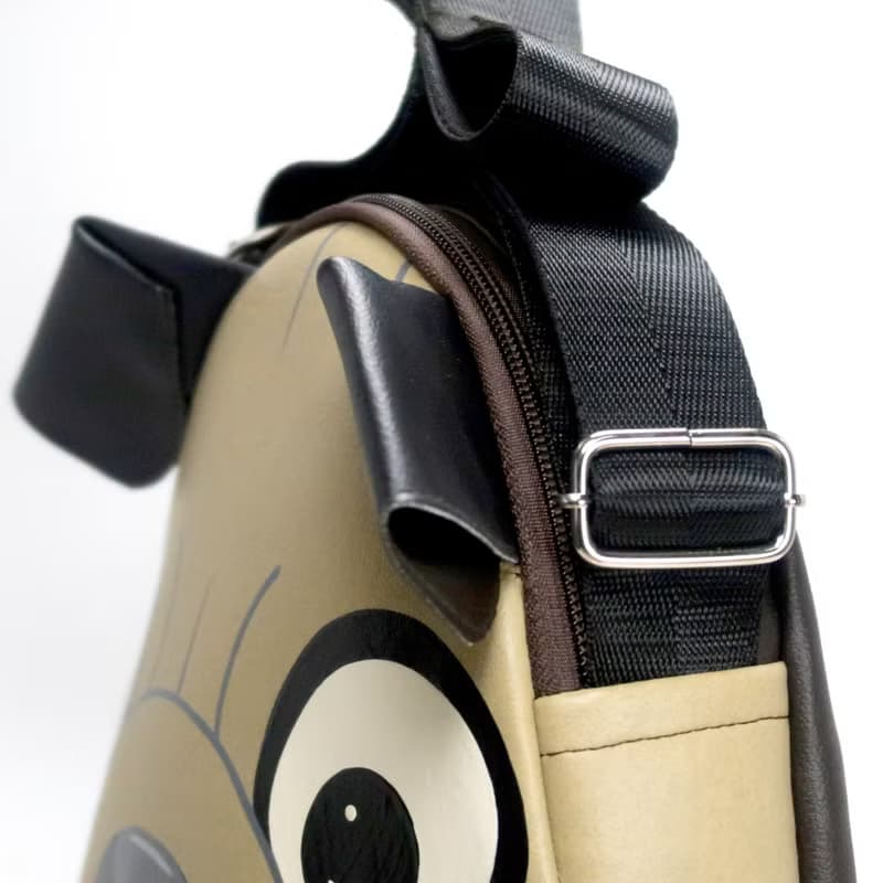 Pug crossbody bag is compact fro carrying mobile phones and other essentials.