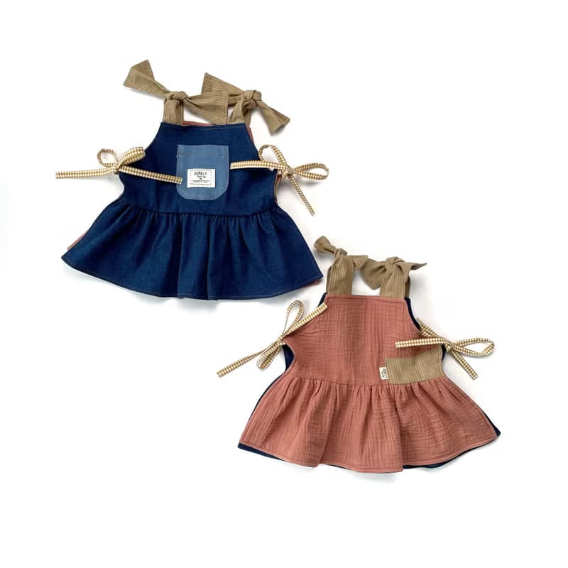 翠絲照顧著植栽 | 雙面牛仔拼接綁帶洋裝式背心罩衫