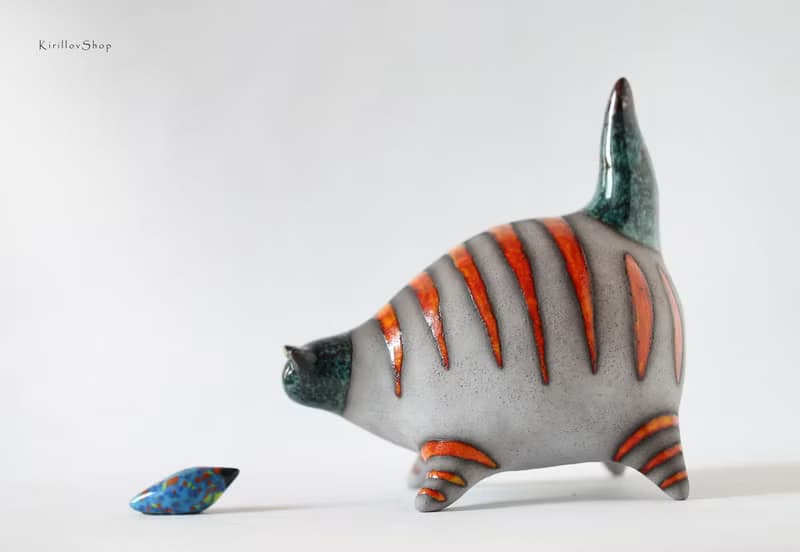 Handmade Ceramic Cat with Fish – Modern Animal Sculpture with Orange Stripes