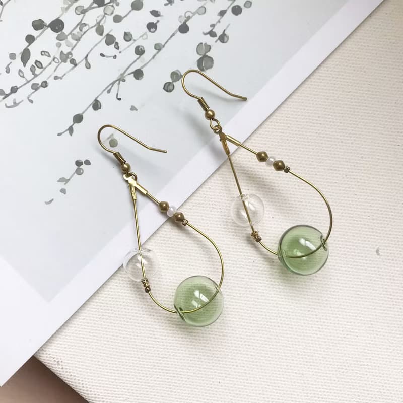 異國泡泡_黃銅耳環_透明與草綠(可改夾)