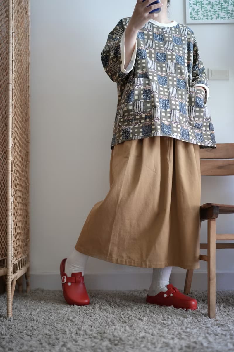 卡其拼接小直筒澎口袋長裙