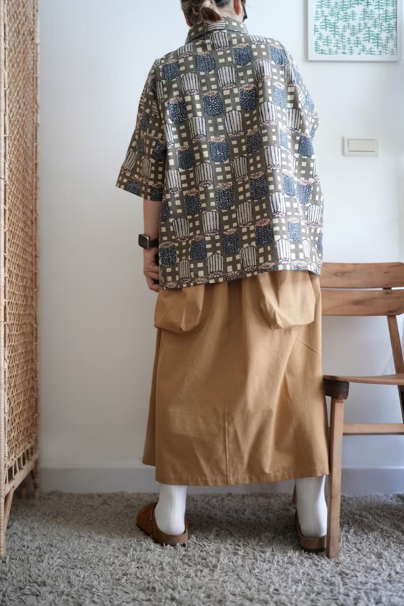 卡其拼接小直筒澎口袋長裙