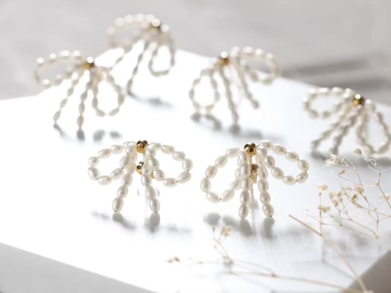 14kgf-pearl ribbon pierced earrings