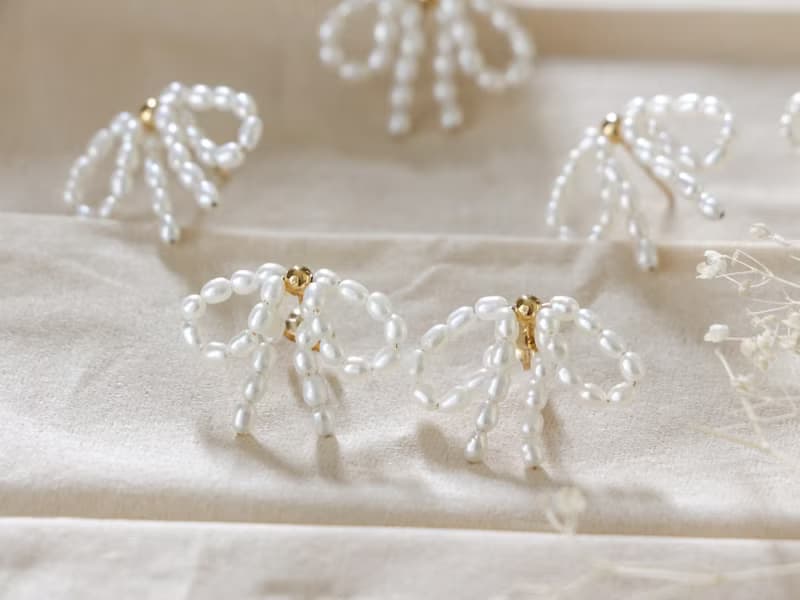 14kgf-pearl ribbon pierced earrings