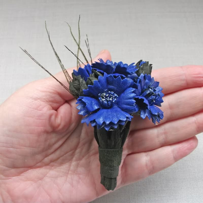 Leather brooch with a bouquet of cornflowers