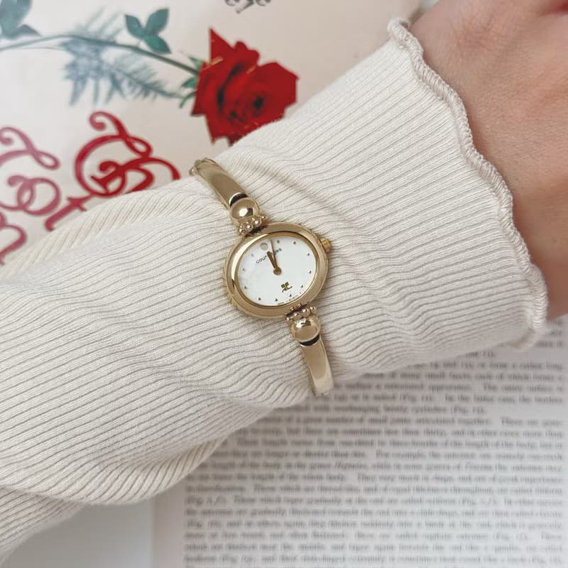 Courreges Gold Tone Bangle Style Bracelet Watch