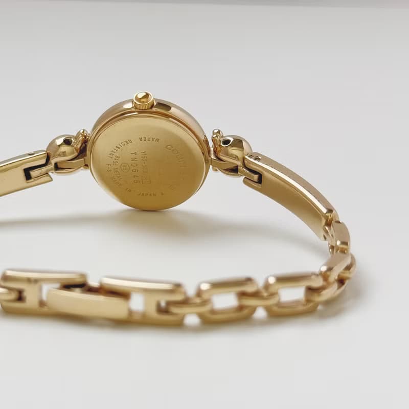 Courreges Gold Tone Bangle Style Bracelet Watch