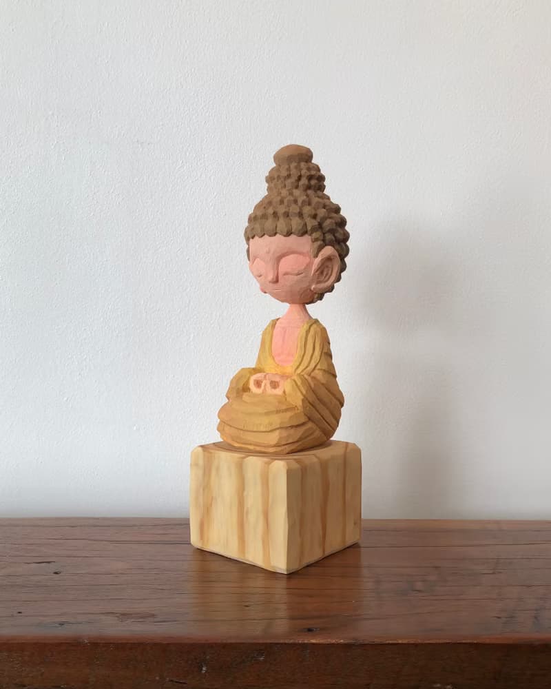 Wooden peaceful Buddha