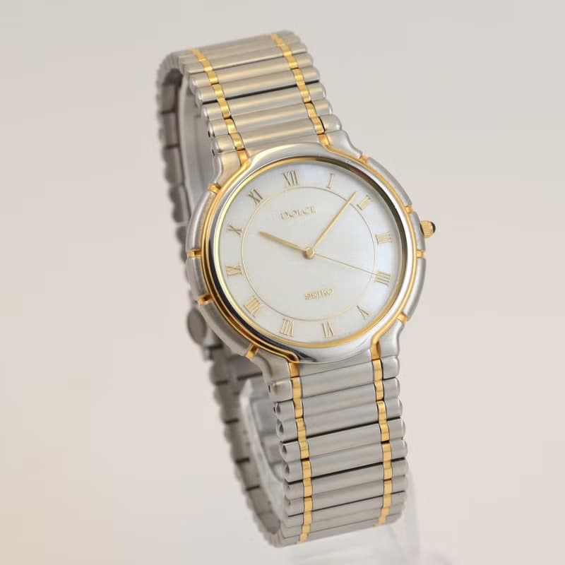 SEIKO DOLCE 男性用腕時計 QUARTZ シェルパール文字盤 ローマンインデックス ゴールド/シルバー Ref.5E31-6B20 手錶 古董錶
