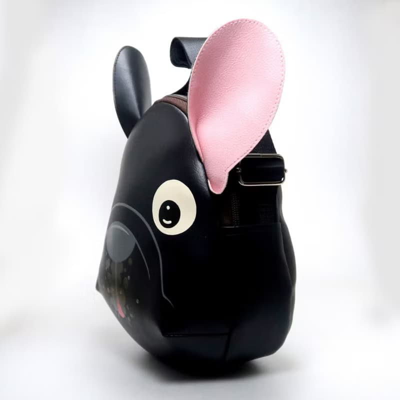 Black french bulldog crossbody bag is compact fro carrying mobile phones.