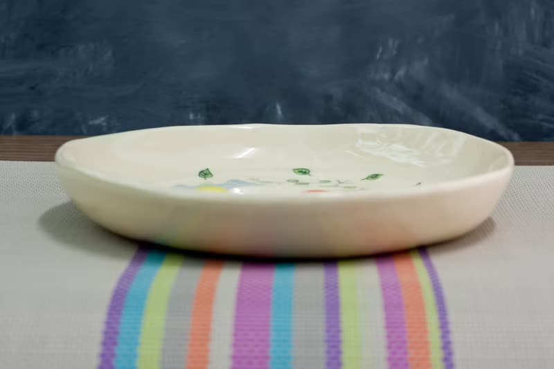 Plate with bear, egg, fish pattern