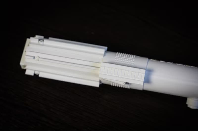 White wedding bouquet holder inspired by Luke's lightsaber hilt