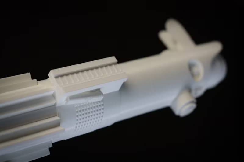 White wedding bouquet holder inspired by Luke's lightsaber hilt