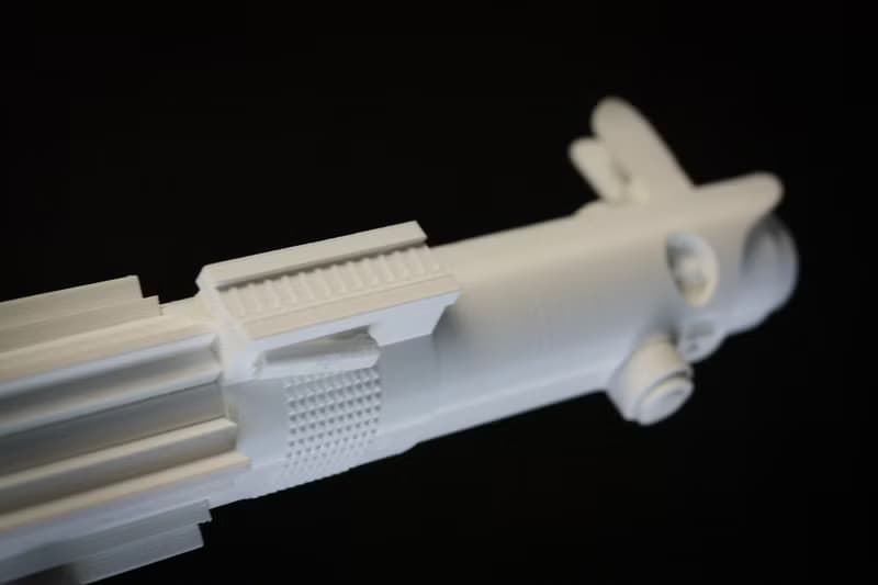 White wedding bouquet holder inspired by Luke's lightsaber hilt