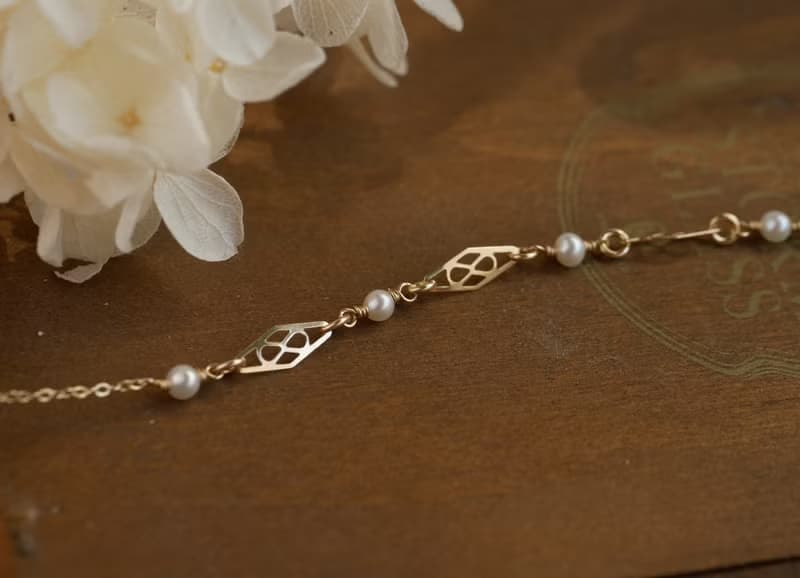 日光窗花 14kgf 天然珍珠鏤空手鍊