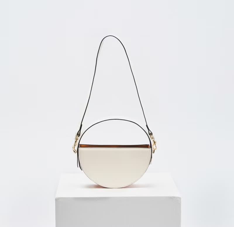 The ONE Bag 素皮革圓包 手拿包 斜背包 側背包 米白色x淺棕色