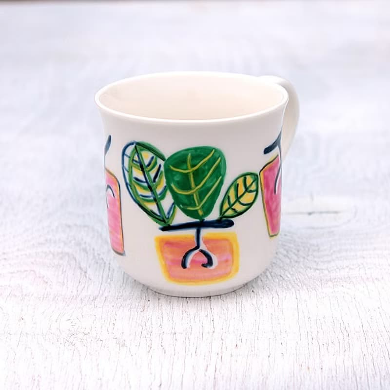 ローズピンクの柿模様のマグカップ