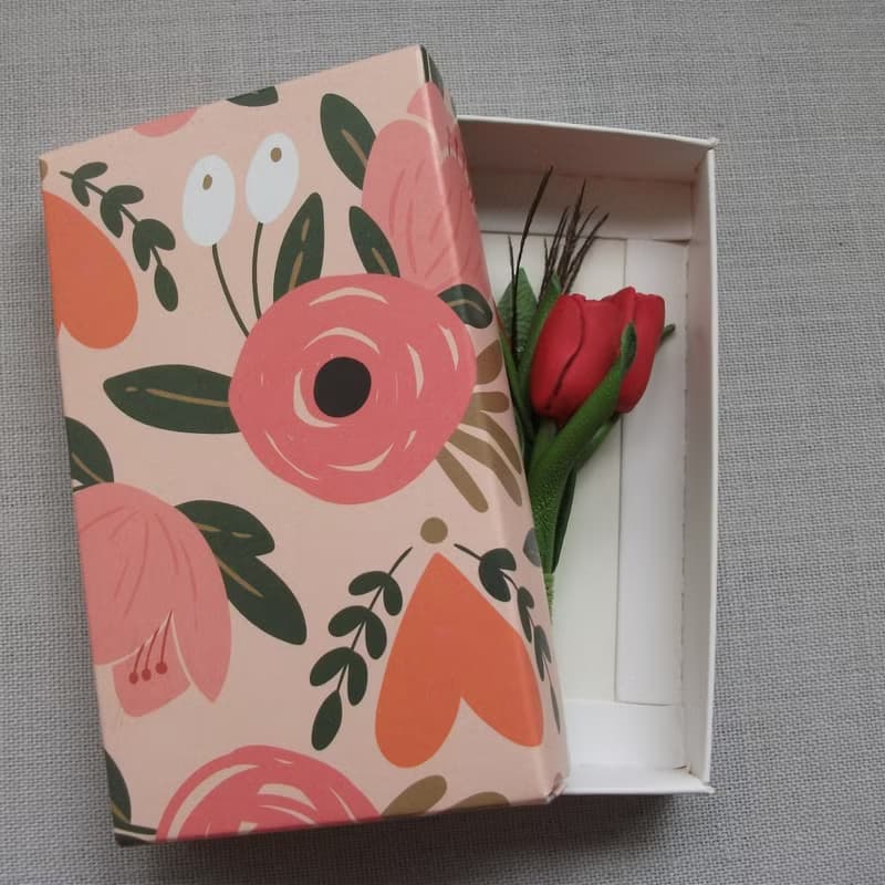 Small brooch made of genuine leather with a bouquet of coral tulips