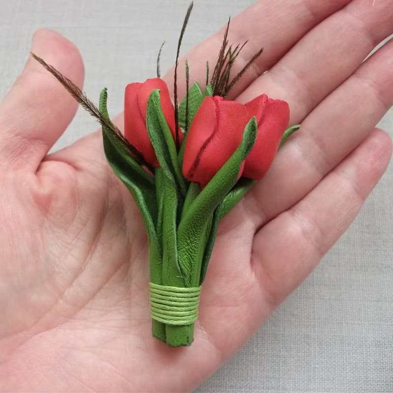 Small brooch made of genuine leather with a bouquet of coral tulips