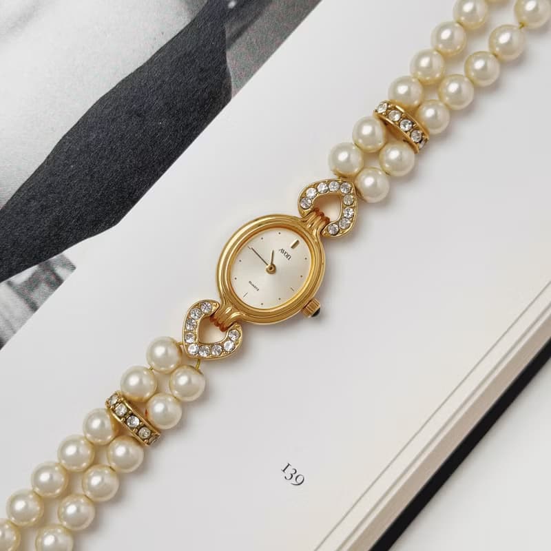 Avon Gold Tone With Faux Pearl Bracelet Watch