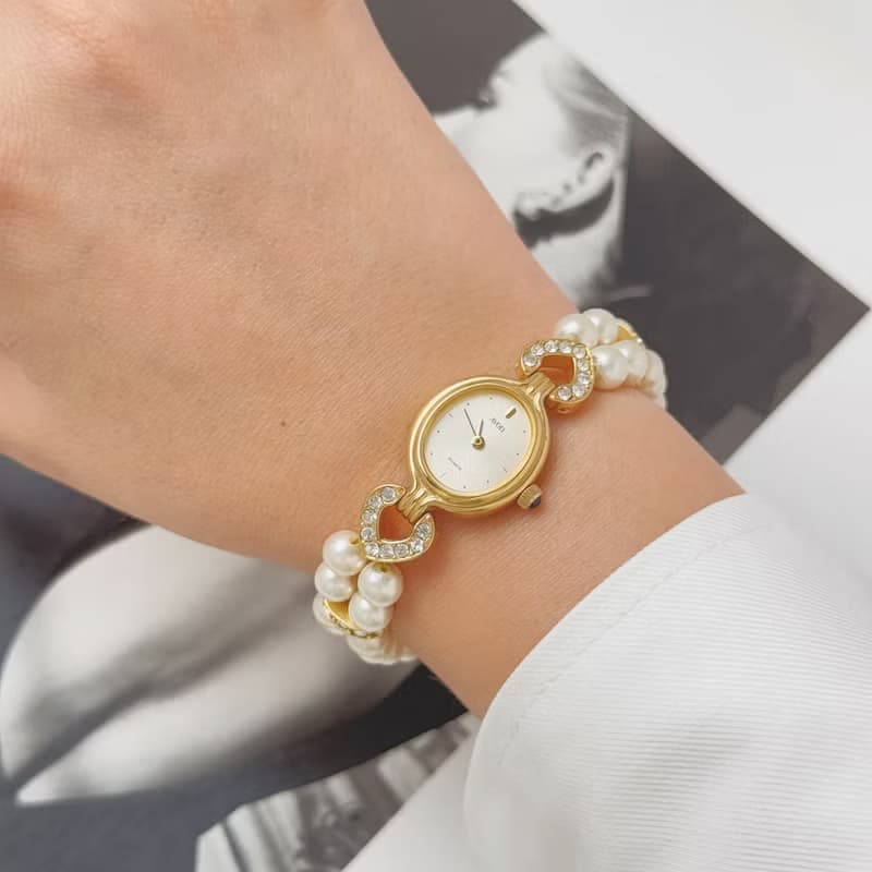 Avon Gold Tone With Faux Pearl Bracelet Watch