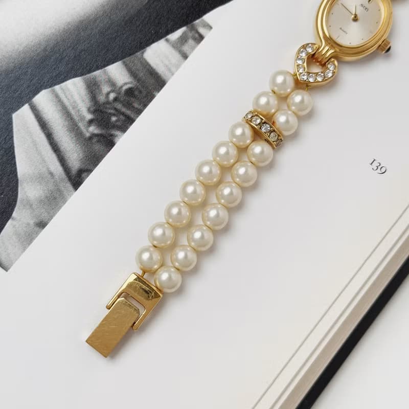 Avon Gold Tone With Faux Pearl Bracelet Watch
