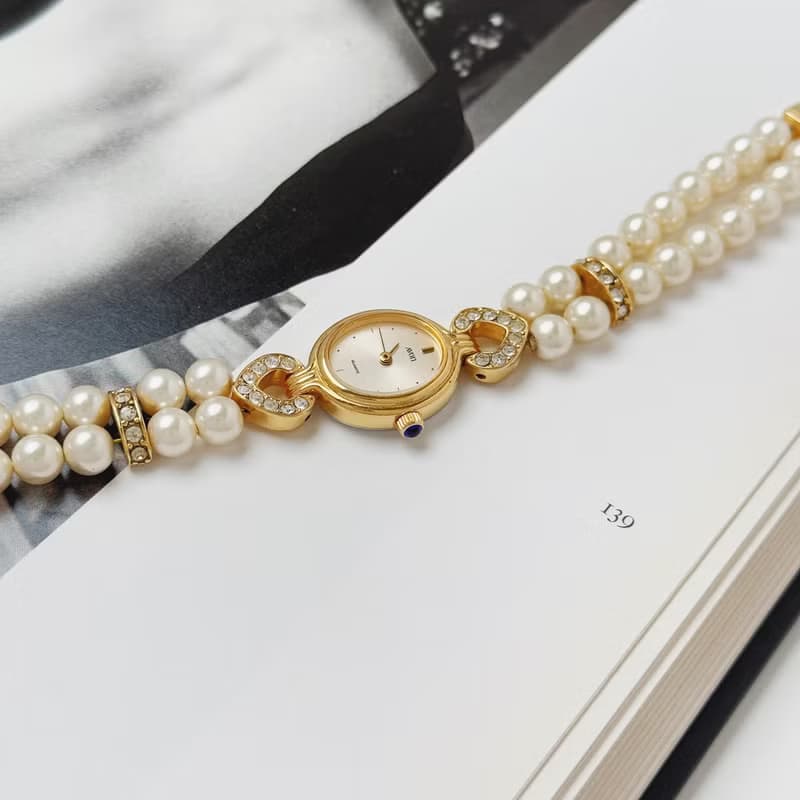 Avon Gold Tone With Faux Pearl Bracelet Watch