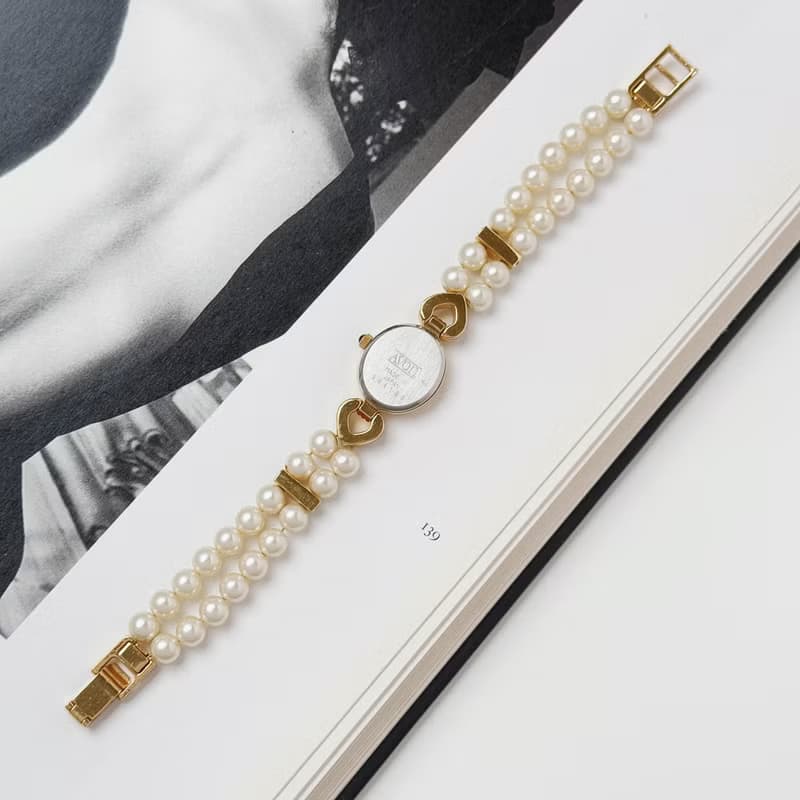 Avon Gold Tone With Faux Pearl Bracelet Watch