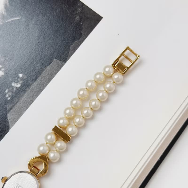 Avon Gold Tone With Faux Pearl Bracelet Watch