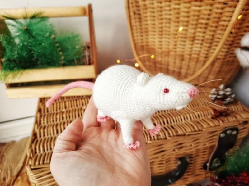 Soft toy life-size white rat with red eyes. White mouse toy.