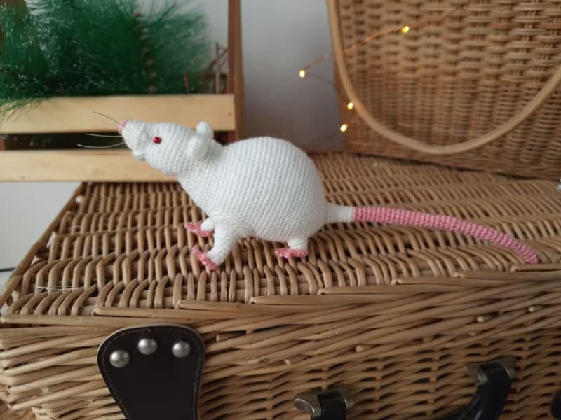 Soft toy life-size white rat with red eyes. White mouse toy.