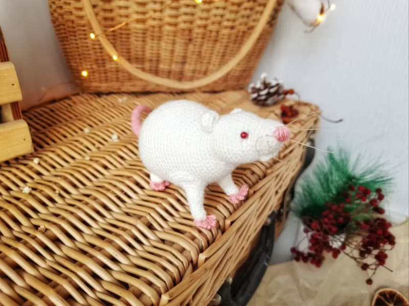 Soft toy life-size white rat with red eyes. White mouse toy.