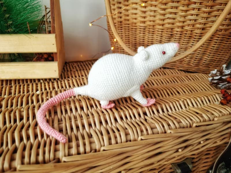 Soft toy life-size white rat with red eyes. White mouse toy.