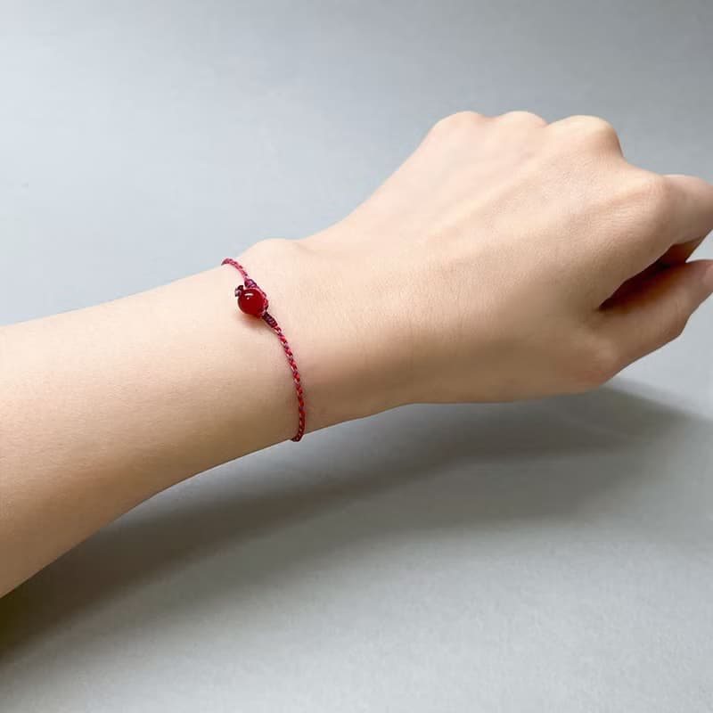 紅瑪瑙四股編超細蠟線編織手環(紅+紫紅+藕紫)