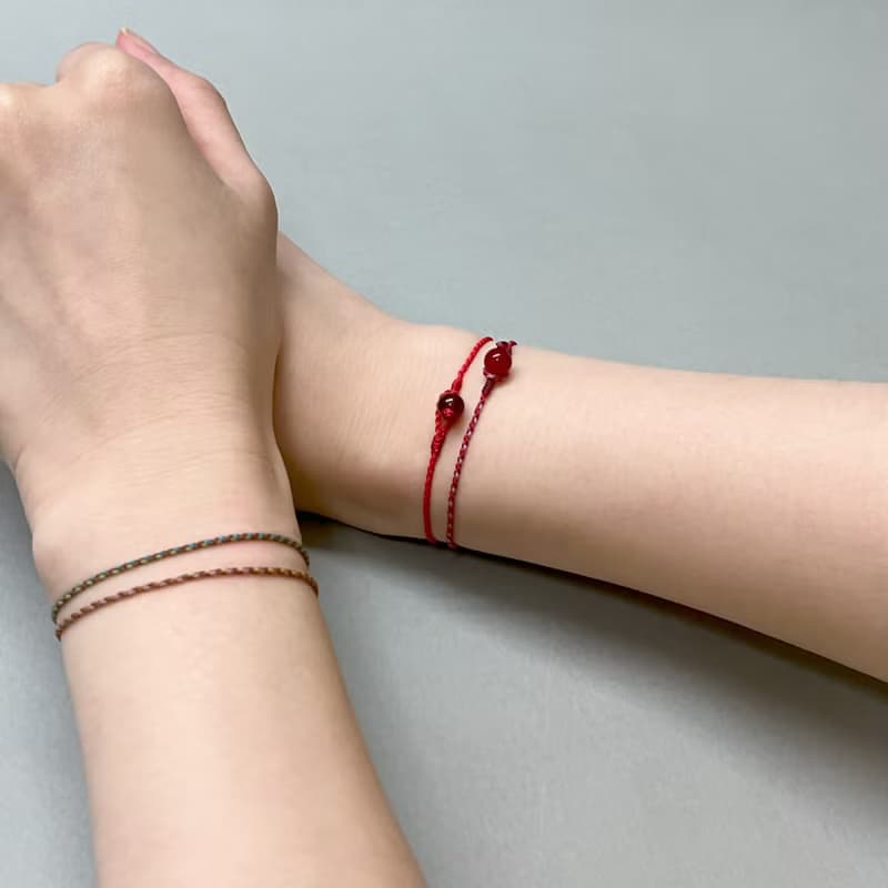 紅瑪瑙四股編超細蠟線編織手環(紅+紫紅+藕紫)