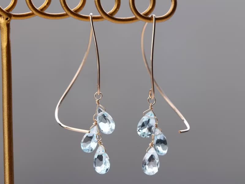 14kgf- skyblue topaz halfcurl pierced earrings
