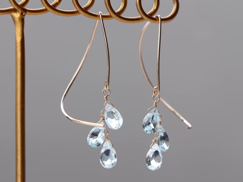 14kgf- skyblue topaz halfcurl pierced earrings