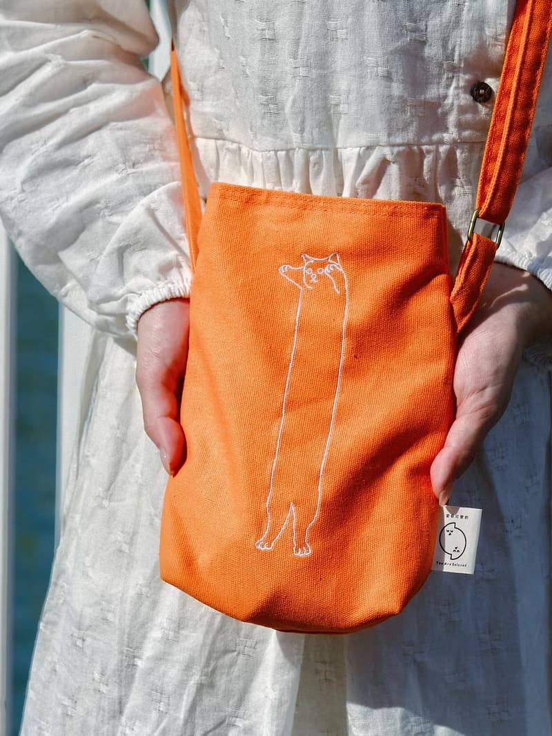 橙色伸長長貓刺繡斜孭袋