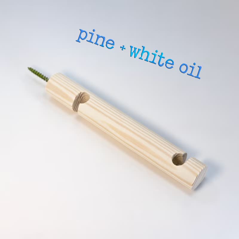 Pine wall bracket for hanging plug-In pendant and plant on wall.