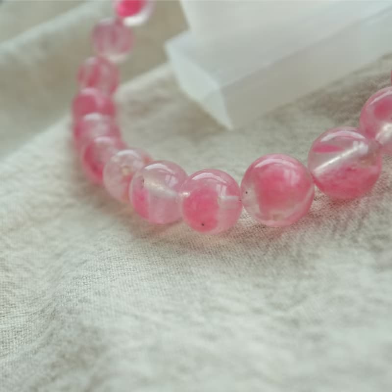 心之漫雨 :: 薔薇輝櫻花雨、白水晶、粉晶愛心手鍊