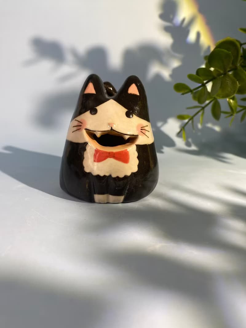 Cute handmade ceramic dolls for home decoration.