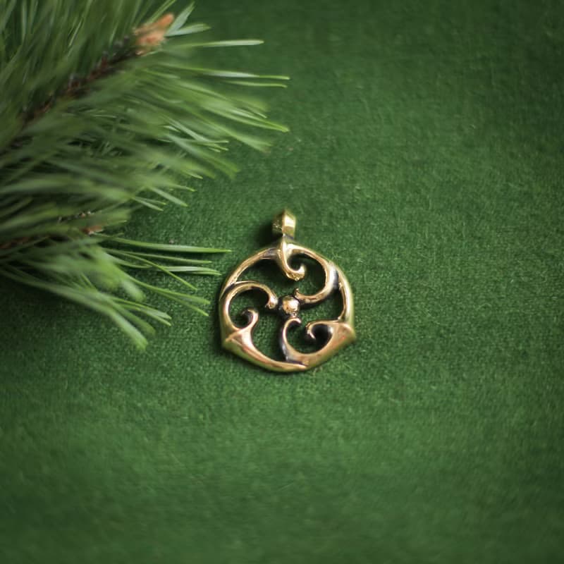Triskele pendant on leather cord. Triskelion necklace. Celtic jewelry. Pagan Art