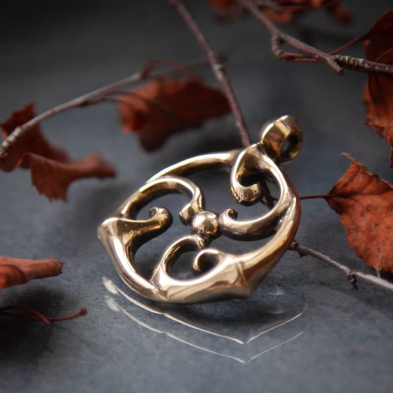 Triskele pendant on leather cord. Triskelion necklace. Celtic jewelry. Pagan Art