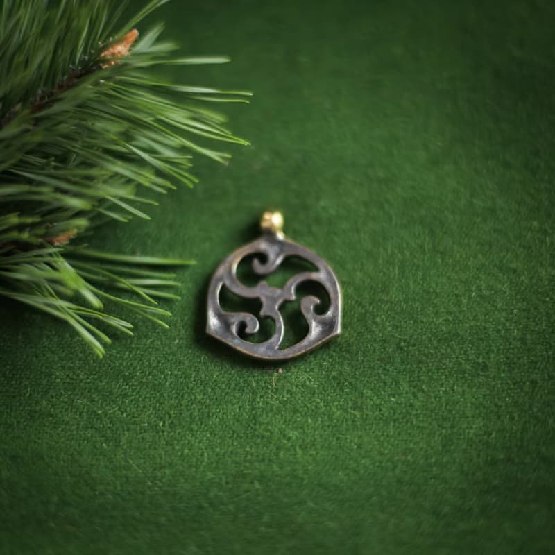 Triskele pendant on leather cord. Triskelion necklace. Celtic jewelry. Pagan Art